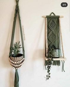 two macrame wall hangings with plants in them