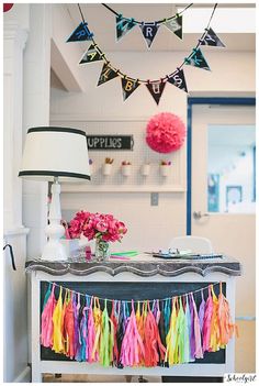 the table is decorated with tissue tassels