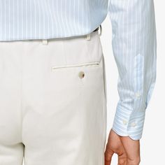 A classic slim fit button-up with a pronounced high widespread collar, this light blue shirt is highlighted by a poplin weave and faint stripe pattern for a bit of understated detail. Light Blue Shirt, Light Blue Shirts, Slim Fit Shirt, Style Expert, Egyptian Cotton, Blue Shirt, Fashion Advice, Stripes Pattern, Workout Shirts