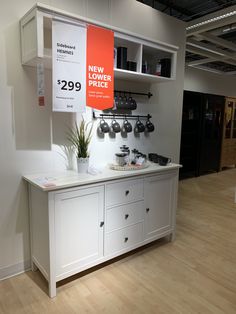 a white counter top sitting inside of a store