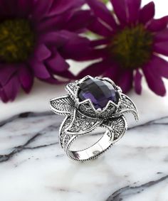 The Filigranist 925 Sterling Silver Lotus Flower Women Ring is a beautiful piece of jewelry that is perfect for any occasion. This ring is made with high quality materials and craftsmanship. The cocktail ring features an amethyst gemstone that is 12 mm and faceted checkerboard round-cut.           Give your style a elevate with this beautiful ring. Enchanting details and natural gemstone make this ring stand out from the crowd. Whether you're dressing up or keeping it casual, this ring is a versatile essential for every day. Elegant and timeless, this ring is perfect for any occasion. It will be your perfect option for thanksgiving, mothers day, valentines day, anniversary and Christmas gift. Thankful to have you as our customer!          The Ring Face Length is 0.70 inches / 17.80 mm and Goth Ring, Ornate Ring, Purple Stone Rings, Flower Women, Statement Ring Silver, Rose Quartz Gemstone, Sterling Silver Filigree, Rings For Girls, Purple Stones