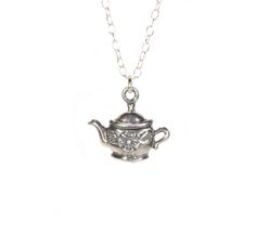 Teapot necklace, tea party necklace, fairytale jewelry, fantasy necklace, tea lovers gift, dainty sterling silver chain This little and dainty sterling silver tea pot hangs from a sterling silver chain in the length of your choice! The teapot measures 15mm x 10mm and is also availbe in 14k gold vermeil on a 14k gold filled chain. More from Bubu Ruby? https://www.etsy.com/shop/BubuRuby?ref=si_shop Looking for other charm necklaces? https://www.etsy.com/shop/BubuRuby?section_id=12318467 ♥ Handmade Fairytale Jewelry, Teapot Necklace, Fairy Tale Jewelry, Fantasy Necklace, Tea Lovers Gift, Party Necklace, Silver Tea, Charm Necklaces, Tea Lovers