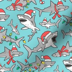 sharks wearing christmas hats and bows on blue background