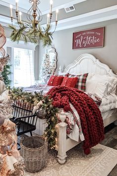 a bedroom decorated for christmas with lots of holiday decorations