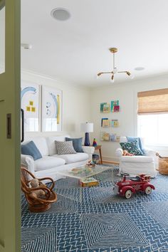 the living room is clean and ready to be used as a child's playroom