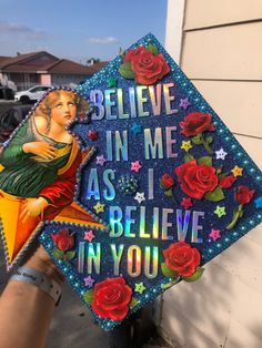 someone is holding up a graduation cap that says believe in me as i believe in you