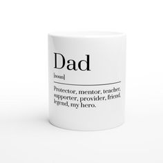 a white coffee mug with the words dad written in black on it's side