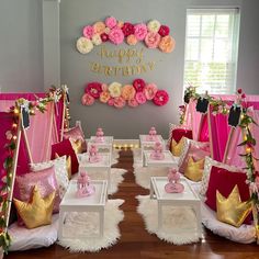 a birthday party with pink and gold decorations