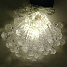 a bunch of lights that are on top of a table with some wires attached to it