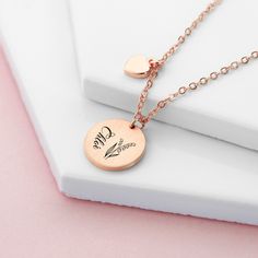 Treat her to a stylish and meaningful gift with our beautiful Personalised Birth Flower Brushed Heart and Disc Necklace. With its unique design, this necklace is perfect for any occasion. Whether you gift it to your mum this Mother’s Day, your girlfriend on Valentine’s or treat a loved one on their birthday, this outstanding piece of women’s jewellery will make the perfect gift for her. Personalise with your loved one’s name and their birth flower - both will be meticulously engraved onto the pendant by our personalisation exports - creating a truly one-of-a-kind gift that will hold real sentimental value to her. Alongside this will be a cute little heart pendant, representing your love - she’ll forever hold it close to her heart. Your necklace will come beautifully nestled inside in a sle Anniversary Necklace With Heart Pendant And Flower Charm, Feminine Rose Gold Charm Necklace For Gift, Feminine Rose Gold Charm Necklace As Gift, Feminine Rose Gold Charm Necklaces Gift, Feminine Heart Necklace For Valentine's Day Gift, Feminine Heart Necklace As A Valentine's Day Gift, Valentine's Day Birth Flower Charm Necklace Gift, Heart-shaped Charm Necklace With Flower For Gift, Valentine's Day Gift Birth Flower Charm Necklace