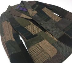 Refreshing a Fall 2020 Collection jacket, this jacket is defined by a beautiful artisanal patchwork technique, composed of the various tweeds and skins used throughout Fall 2022 Collection. Inlaid with a total of 11 different fabrications sewn with a simulation of hand stitches, this jacket is designed with a two-button closure, notch lapels, and genuine horn buttons engraved with “Ralph Lauren.” Brand new with tags. Slim fit.  Intended to hit at the lower hip. Notch lapels.  Two-button placket. Lauren Wood, Cardigan Blazer, Patchwork Cardigan, Leather Patchwork, Purple Label, Ralph Lauren Long Sleeve, Ralph Lauren Purple Label, Fall 2022, Tweed Blazer