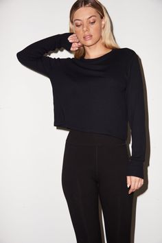 Classic fitting long sleeve top Model is 5'8" and wearing a size small Material: 95% Rayon, 5% Spandex Recommended Care: Machine wash on gentle cycle and tumble dry low Zipper Leggings, Sweaters Hoodies, High Rise Style, Bathing Suit Bottoms, High Rise Leggings, Zipper Detail, Black Rib, Top Model, Black Leggings