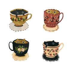 four teacups with different designs on them