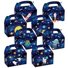 six space themed party boxes in blue and white