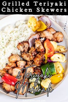 grilled teriyaki chicken skewers and thai marinade on a white plate