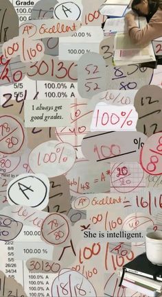 a collage of paper with numbers and symbols on it, all over the place