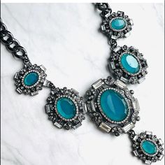 Questions? Leave A Comment Below! Fabulous Piece Crystal Statement Necklace Original From Zara New With Tags Stones Missing Gun Metal With Blue New With Tags Ready To Ship Blue Gemstone Accents Necklace, Elegant Turquoise Jewelry With Rhinestones, Party Turquoise Crystal Necklaces, Blue Crystal Rhinestone Costume Necklace, Blue Crystal Jewelry With Gemstone Accents, Party Turquoise Necklace With Rhinestones, Elegant Blue Rhinestone Necklace With Sparkling Stones, Elegant Blue Crystal Rhinestone Necklace, Blue Party Necklace With Bling