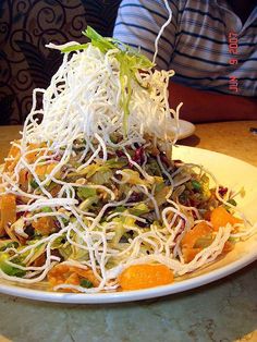 a white plate topped with lots of veggies