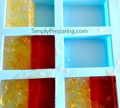 an ice tray filled with different types of gummy bears