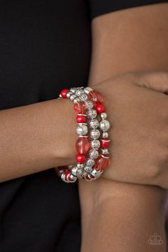 An array of glassy and polished red beading and mismatched silver accents are threaded along stretchy elastic bands, creating colorful layers across the wrist. Sold as one set of three bracelets. Red Beaded Bracelet, Bracelet Set Silver, Red Bracelet, Red Bracelets, Paparazzi Accessories, Gold Choker, Blue Gems, Stretchy Bracelets, Paparazzi Jewelry