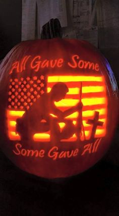 a carved pumpkin with an american flag and the words all gave some, some gave all