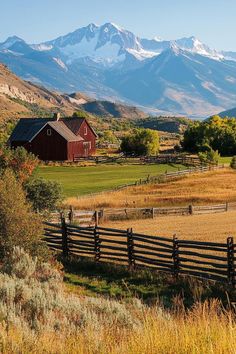 a farm with mountains in the background