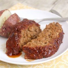 meatloaf and potatoes on a white plate