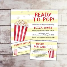 two movie themed baby shower cards with popcorn on them