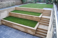 an outdoor area with steps and grass