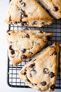 chocolate chip scones on a cooling rack with one cut in half and the other whole