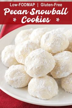 snowball cookies on a white plate with red napkin