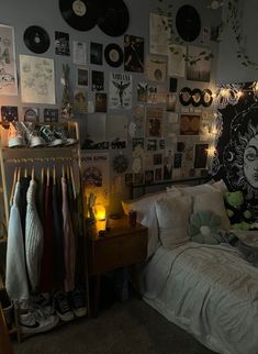 a bedroom with lots of records on the wall