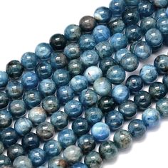 the beads are blue and brown with black spots on them, one is round shaped