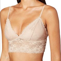 Lace, Lace, Everywhere. A Wide Band Of Lace, Front And Back Turns This Longline Lace Bralette From Maidenform Into A Longline Style. Bralette, Pullover, Wire-Free, Micro-Fiber Lined Cups Are Lace Covered For Modesty And Support, Fully Adjustable Shoulder Straps. Color: Cafe Au Lait Available In Small, Medium, And Xl! Lace Camisole Bra With Lace Trim, Beige Lace Bra Comfortable, Feminine Lace With Built-in Bra, Beige Lace Bra With Lace Closure, Lace Camisole Top Bra, Lace Camisole Bra With Lace Top, Elegant Lace Bra With Lace Top, Seamless Lace Top, Beige Stretch Lace Bra