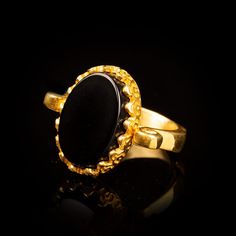 Black Aqeeq Gold Plated Silver Women Ring. Handmade in 925 sterling silver with agate stone. On the ring Oval Black Aqeeq - Agate stone settled. Gold color plated 925 sterling silver. Dimensions of stone is 20 mm x 15 mm. Average weight of Black Aqeeq Gold Plated Silver Women Ring is 8 gr. (depends your ring size). Back side is open and stone touches your skin. Classic and exclusive style. Stone Type: Aqeeq - Agate, Onyx Stone Color: Black Stone Dimensions: 20 mm x 15 mm Stone Shape: Oval Averag Luxury Onyx Jewelry With Hallmark, Heirloom Black Jewelry With Cabochon, Luxury Hallmarked Onyx Jewelry, Heirloom Black Cabochon Jewelry, Hallmarked Round Onyx Jewelry, Round Onyx Hallmarked Jewelry, Hallmarked Onyx Round Jewelry, Collectible Onyx Ring Jewelry, Classic Hallmarked Onyx Jewelry