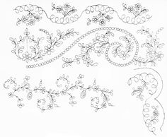 an embroidered design with flowers and vines on white paper, including the word love written in cursive writing