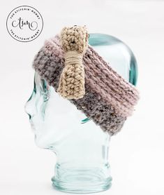 a crocheted hat is on top of a head