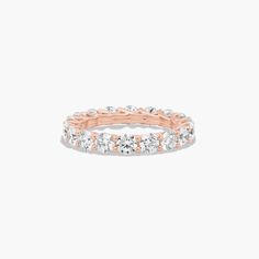 a rose gold and white diamond ring