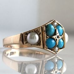 Details: Sweet European made Victorian cluster turquoise ring with pearls and a rose cut diamond in the center. A very beautiful ring with 15K yellow gold, bright blue turquoise stones, Pearls, seed pearls and a rose cut diamond. This piece is so sweet. The center stone area of the ring measures 18mm wide x 10mm at the widest point. Hallmarked 15CT. Please ask all necessary questions prior to placing an order. Measurements: The size is 7 US and can be sized for a fee. Condition: The overall all Filigree Ring Gold, Engagement Ring Photos, Pearl Rose, 14k Rose Gold Ring, Gold Engraving, Turquoise Stones, Lovely Ring, Beautiful Ring, Rose Cut Diamond