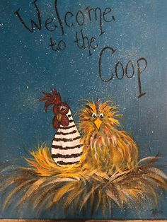 a welcome to the coop painted on a blue background with black and white striped hat