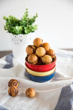 some nuts are sitting in a bowl on a table