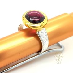 Elegant Elegant Gemstone Ring. High-quality workmanship and frame. Highest jewelry quality! Material: 925 silver (nickel-free; does not turn black) with 18 carat/3 micron gold plated (thick layer for life brushed ring band, garnet as a round cabochon Ring band dimensions: 3-6 mm Bead/stone size including setting: 13 x 13 mm Lightweight and comfortable to wear thanks to the flat ring band. Easy to combine with other rings thanks to the raised setting. Particularly elegant with other rings from th Modern Formal Ruby Ring, Modern Gold Ruby Ring As Gift, Modern Gold Ruby Ring For Gift, Modern Gemstone Stackable Rings For Formal Events, Modern Gemstone Stackable Rings For Formal Occasions, Modern Stackable Gemstone Rings For Formal Events, Modern Ruby Rings With Bezel Setting, Modern Ruby Ring With Bezel Setting, Modern Round Ruby Ring