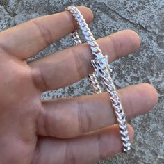 Men's Miami Cuban chain bracelet. Measures 8.5" inch long x 6MM thick. 925 Sterling silver - stamped "925". Real solid 925 sterling silver jewelry. Solid weight to it at approx. 20 grams. Stylish & secure snap box lock w/stamp. Won't change color or turn your skin green. Really well made piece shines bright. Enjoy a 30 day satisfaction guarantee. FREE SHIPPING in USA. Order now! Plain Bracelet, Cuban Chain Bracelet, Cuban Bracelet, Miami Cuban Link, Miami Cuban, Hip Hop Jewelry, Cuban Chain, Cuban Link, 925 Sterling Silver Jewelry