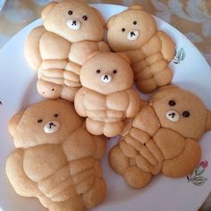 cookies shaped like teddy bears on a plate