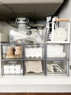 the under sink organization bins are organized