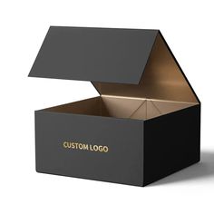 an open black box with gold lettering on the lid and bottom that says custom logo