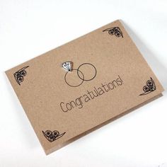 congratulations card with two wedding rings on it