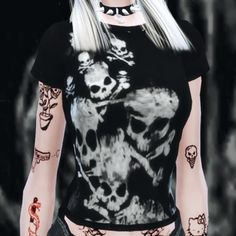 a woman with white hair and tattoos on her body wearing a black t - shirt