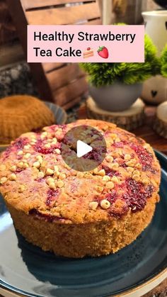 a healthy strawberry tea cake on a blue plate