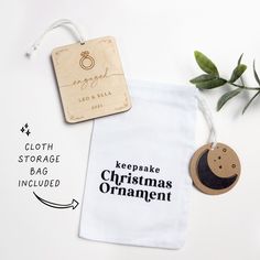 a white bag with a wooden ornament next to it